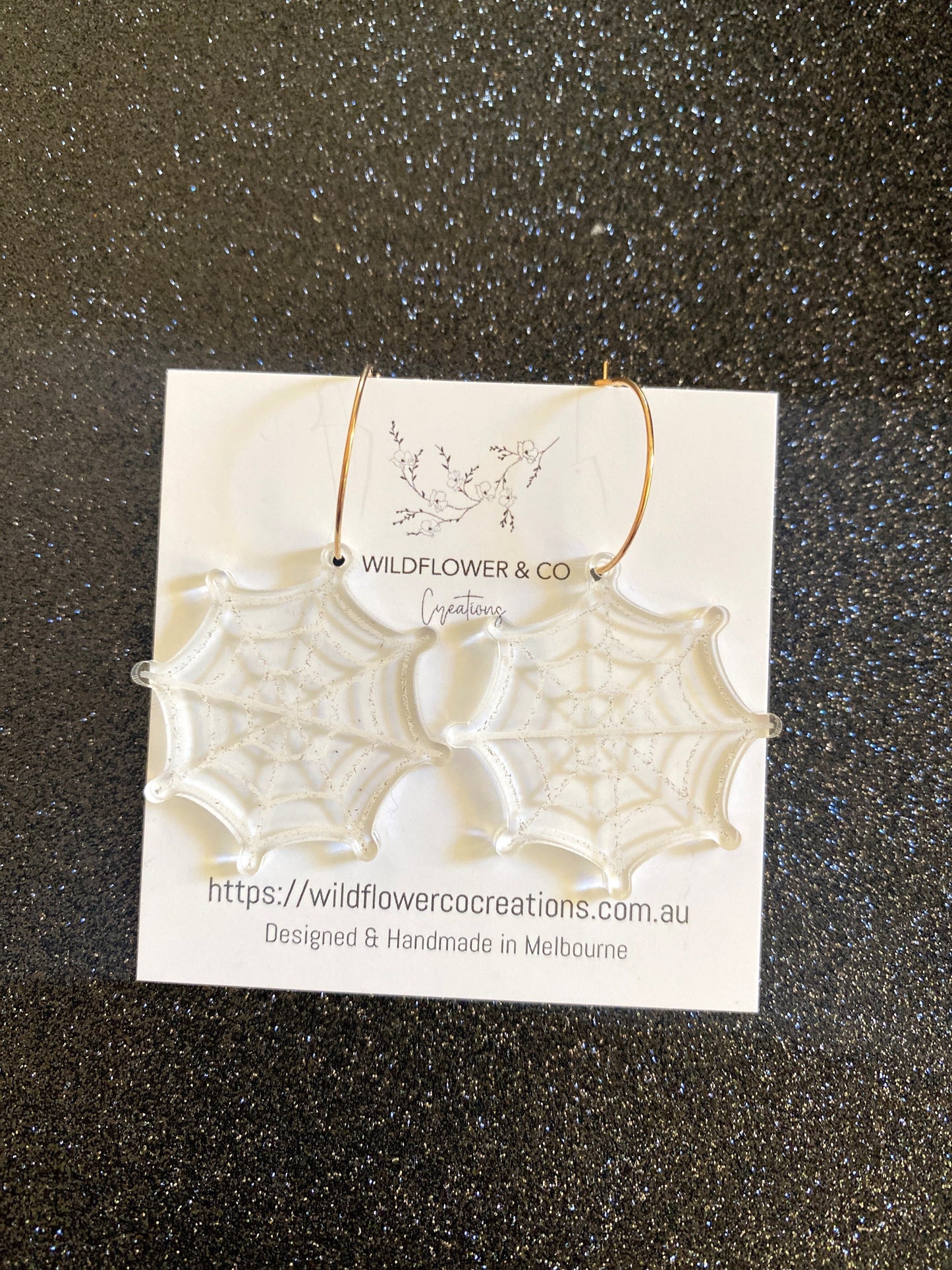 Spiderweb statement Dangles