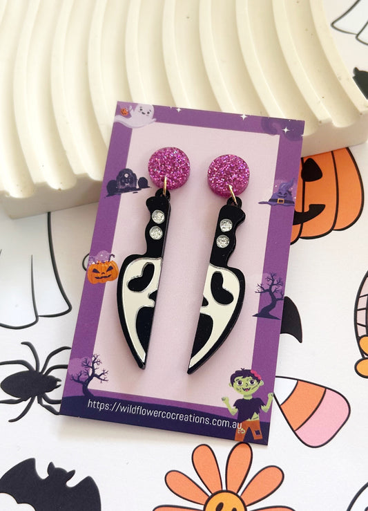 Ghost face knife dangles