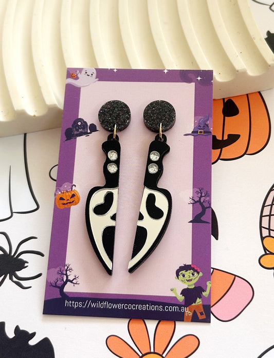 Ghost face knife dangles